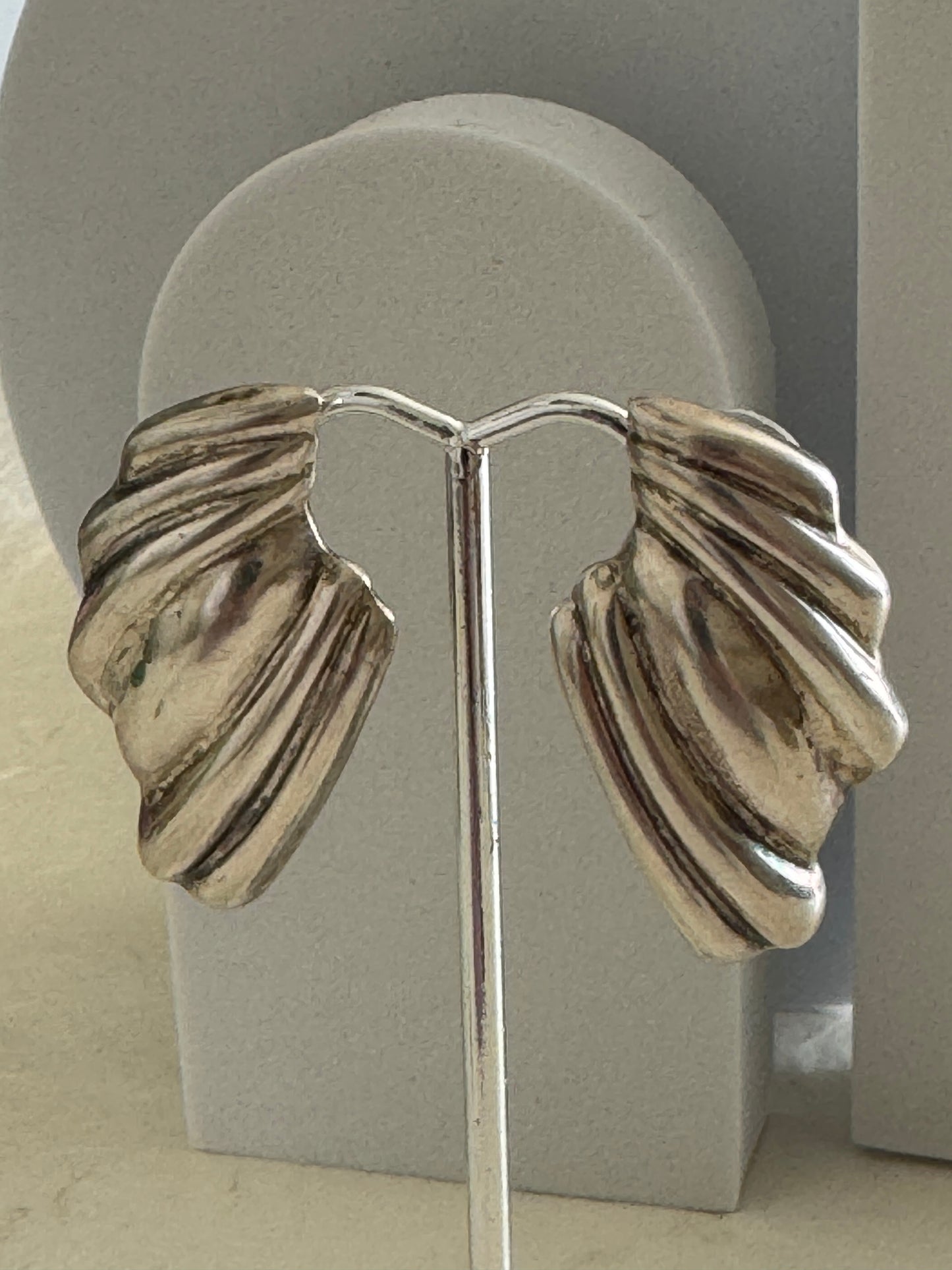 Vintage Mexican sterling silver wing post earrings with ribbed feather texture and Mexico 925 hallmarks