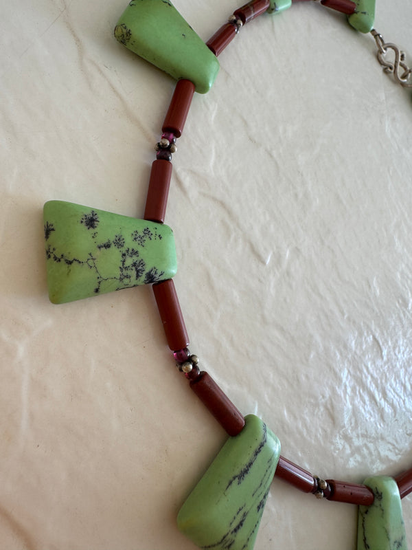Vintage green aventurine garnet agate sterling silver beaded necklace with black matrix patterns and S-hook clasp from 1970s-80s
Shopify Tags:
vintage aventurine necklace, green aventurine jewelry, garnet necklace, vintage gemstone necklace, sterling silver necklace, 1970s jewelry, 1980s jewelry, bohemian necklace, New Age jewelry, metaphysical jewelry, crystal healing jewelry, vintage boho necklace, estate jewelry, vintage beaded necklace, aventurine garnet necklace, vintage stone necklace, hippie jewelry,