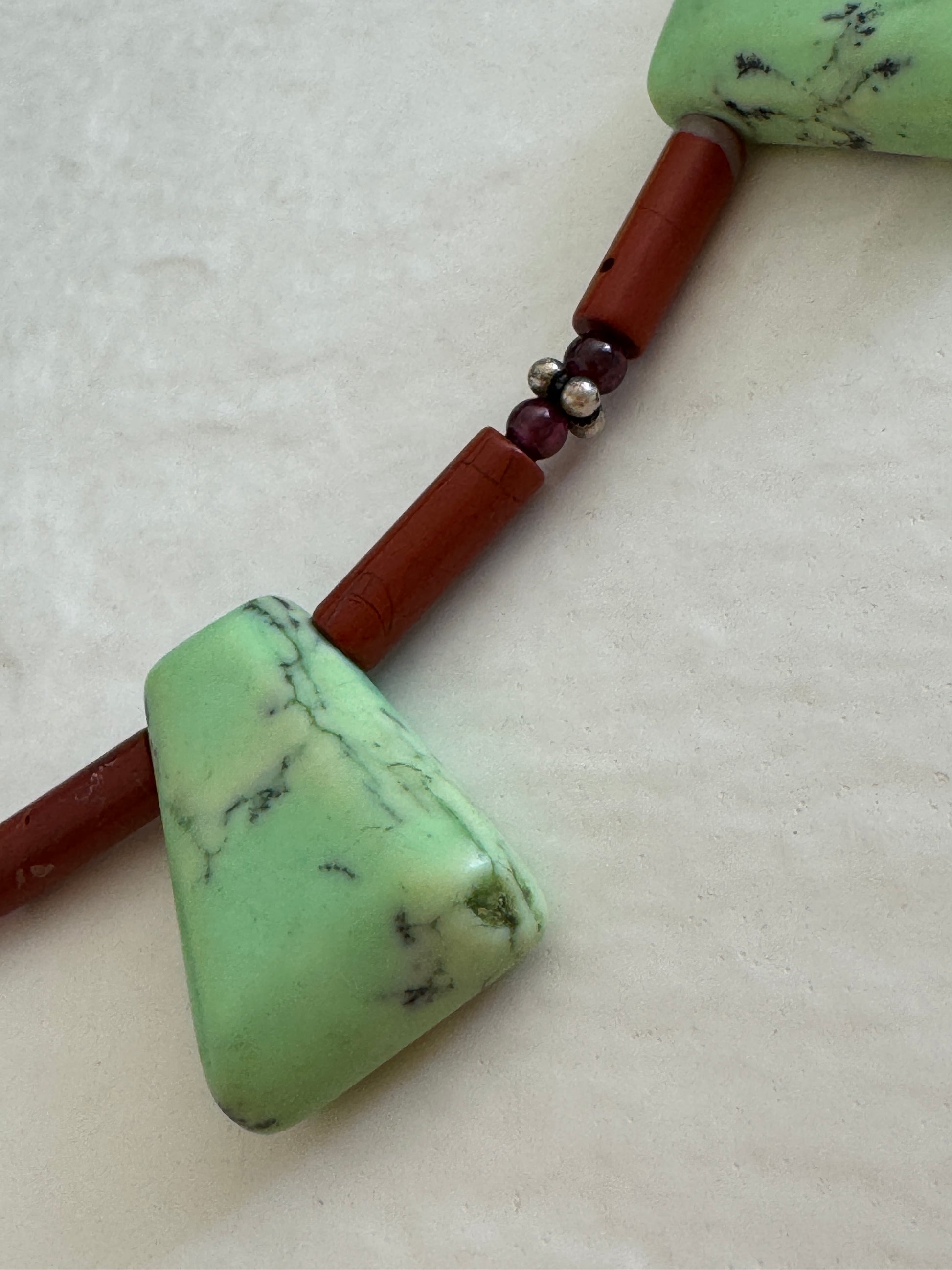 Vintage green aventurine garnet agate sterling silver beaded necklace with black matrix patterns and S-hook clasp from 1970s-80s
Shopify Tags:
vintage aventurine necklace, green aventurine jewelry, garnet necklace, vintage gemstone necklace, sterling silver necklace, 1970s jewelry, 1980s jewelry, bohemian necklace, New Age jewelry, metaphysical jewelry, crystal healing jewelry, vintage boho necklace, estate jewelry, vintage beaded necklace, aventurine garnet necklace, vintage stone necklace, hippie jewelry,