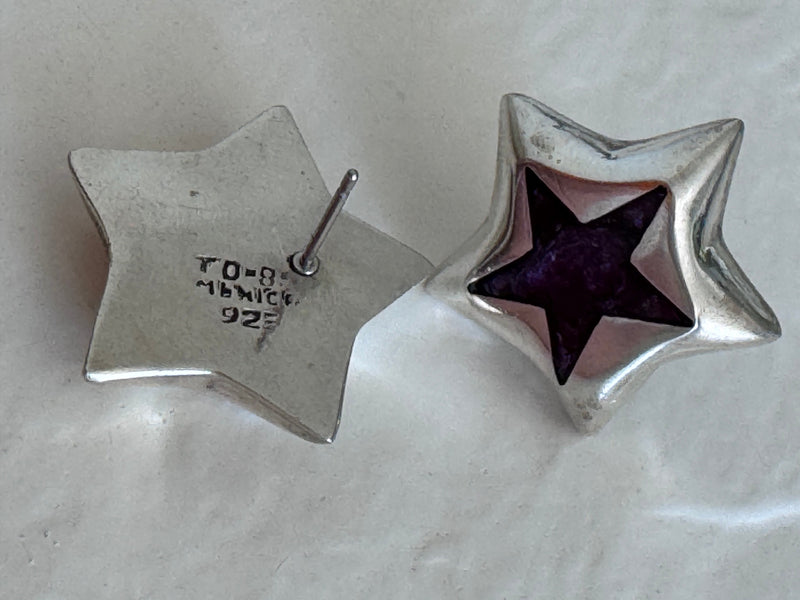 Estate Taxco Mexican sterling silver star earrings with deep purple enamel inlay, showing TD-89 workshop marking and dimensional construction