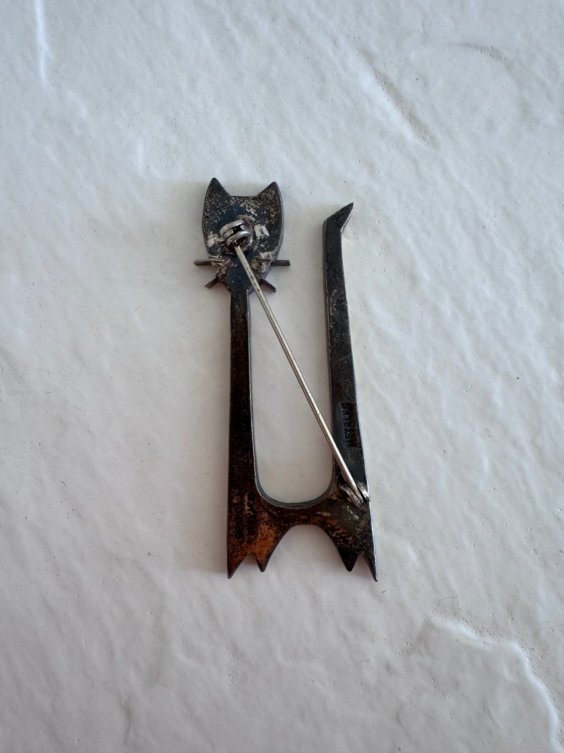 Vintage Mexican Metales modernist cat brooch with geometric design and Hecho En Mexico hallmarks, approximately 2 1/8 inches