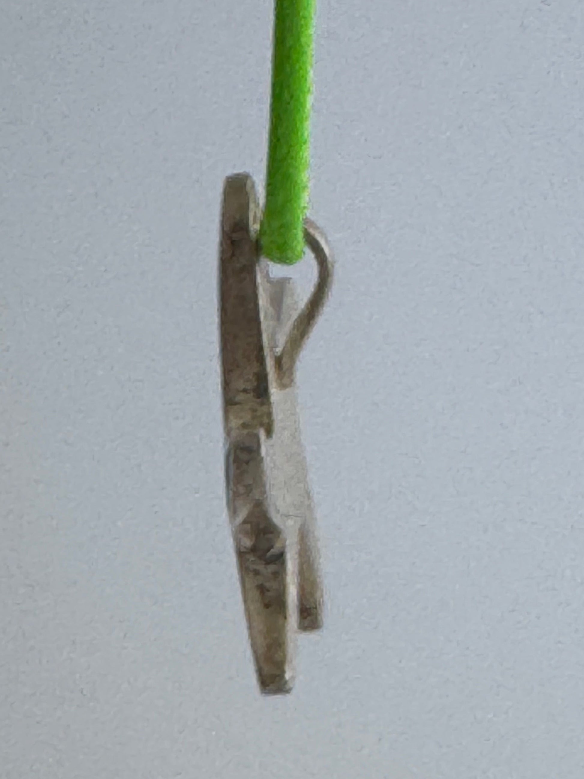 Vintage sterling silver starfish pendant with mother of pearl and green resin mosaic inlay, showing detailed craftsmanship and 925 hallmark