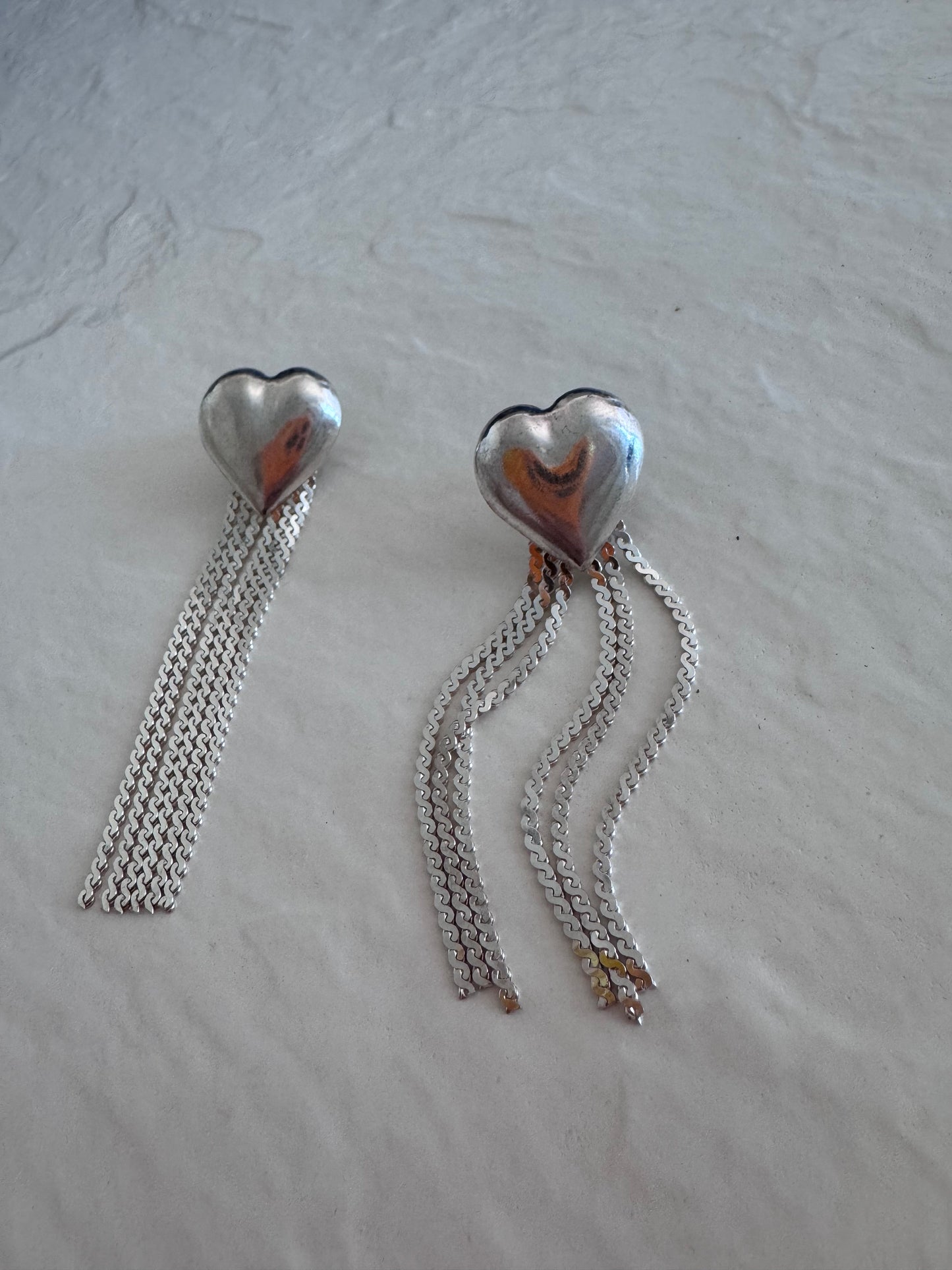 Vintage sterling silver puffy heart earrings with chain tassel fringe, showing 925 hallmarks and never-worn condition