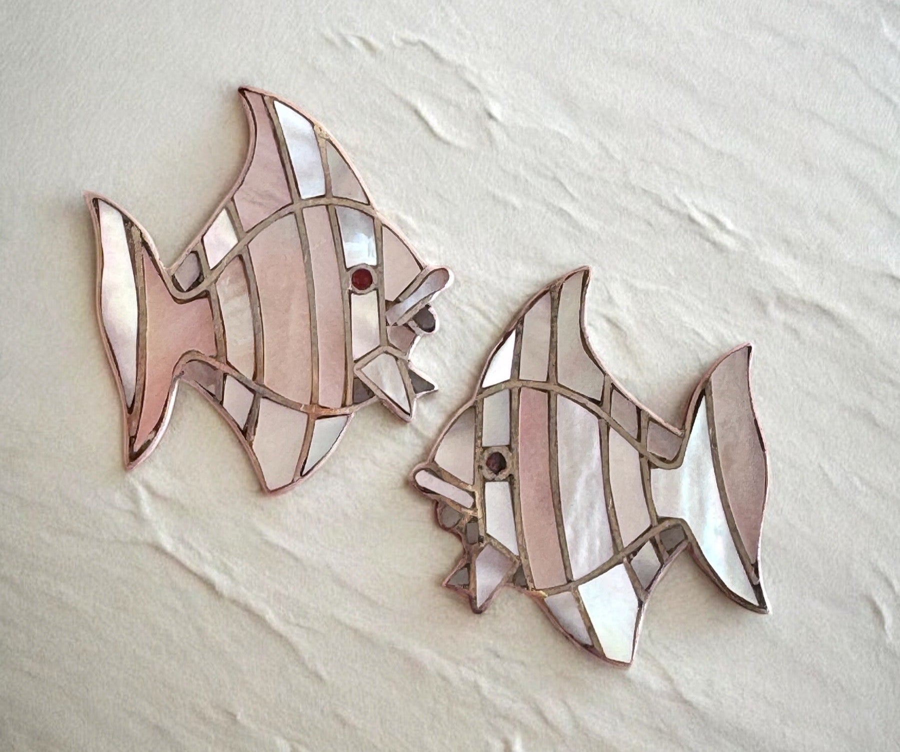 Vintage sterling silver angelfish brooches with mother of pearl mosaic inlay and red accent eyes