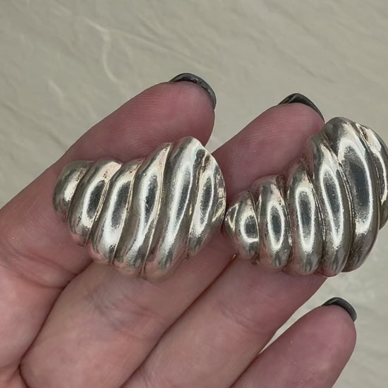Vintage Mexican sterling silver ribbed puffy heart earrings with dimensional swirl pattern and high polish finish