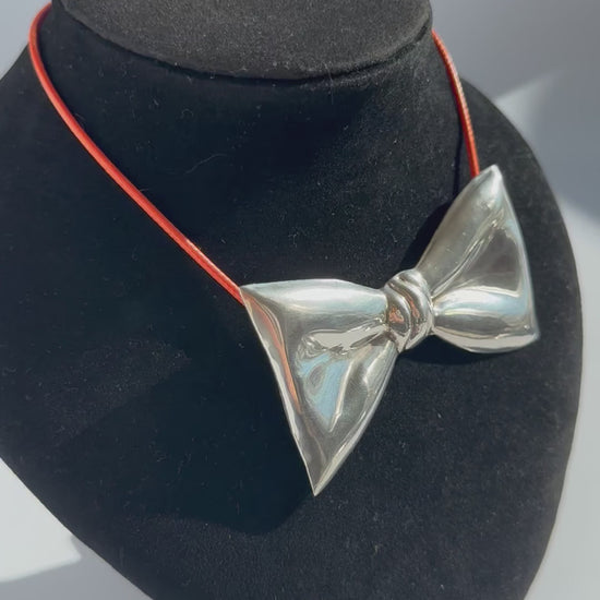 Estate vintage Taxco Mexico TH-24 sterling silver modernist bow pendant brooch with mirror polish finish and dimensional sculptural design