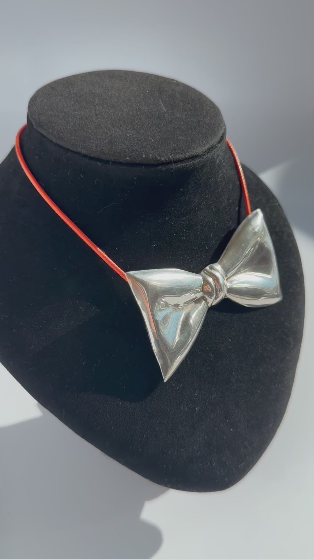 Estate vintage Taxco Mexico TH-24 sterling silver modernist bow pendant brooch with mirror polish finish and dimensional sculptural design