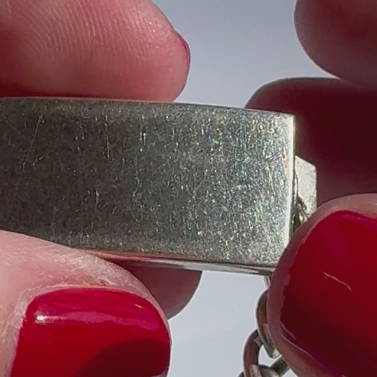 Vintage WWII sterling silver ID bracelet with curb chain and secret locket compartment, estate condition with engravable surface
