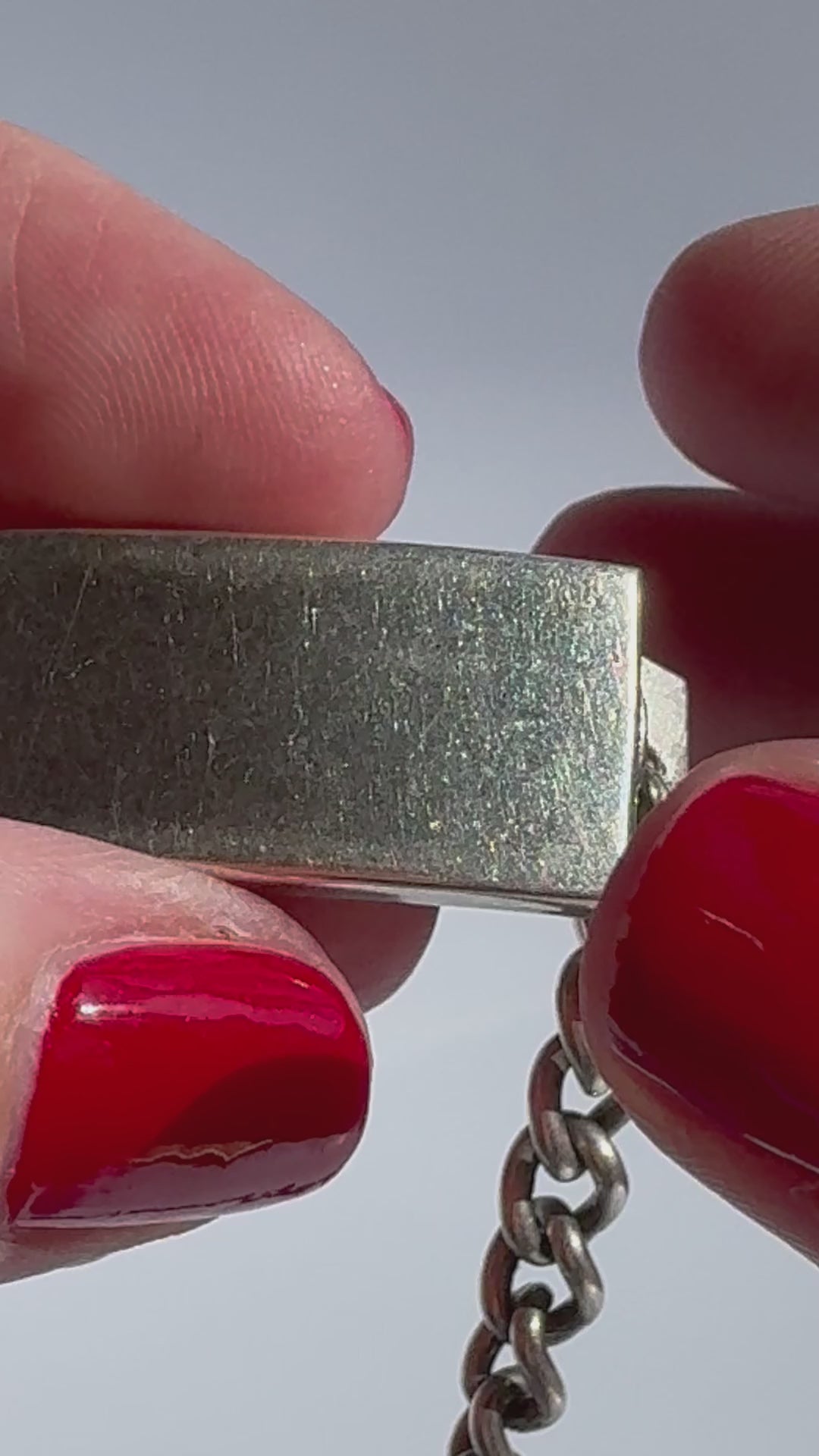 Vintage WWII sterling silver ID bracelet with curb chain and secret locket compartment, estate condition with engravable surface