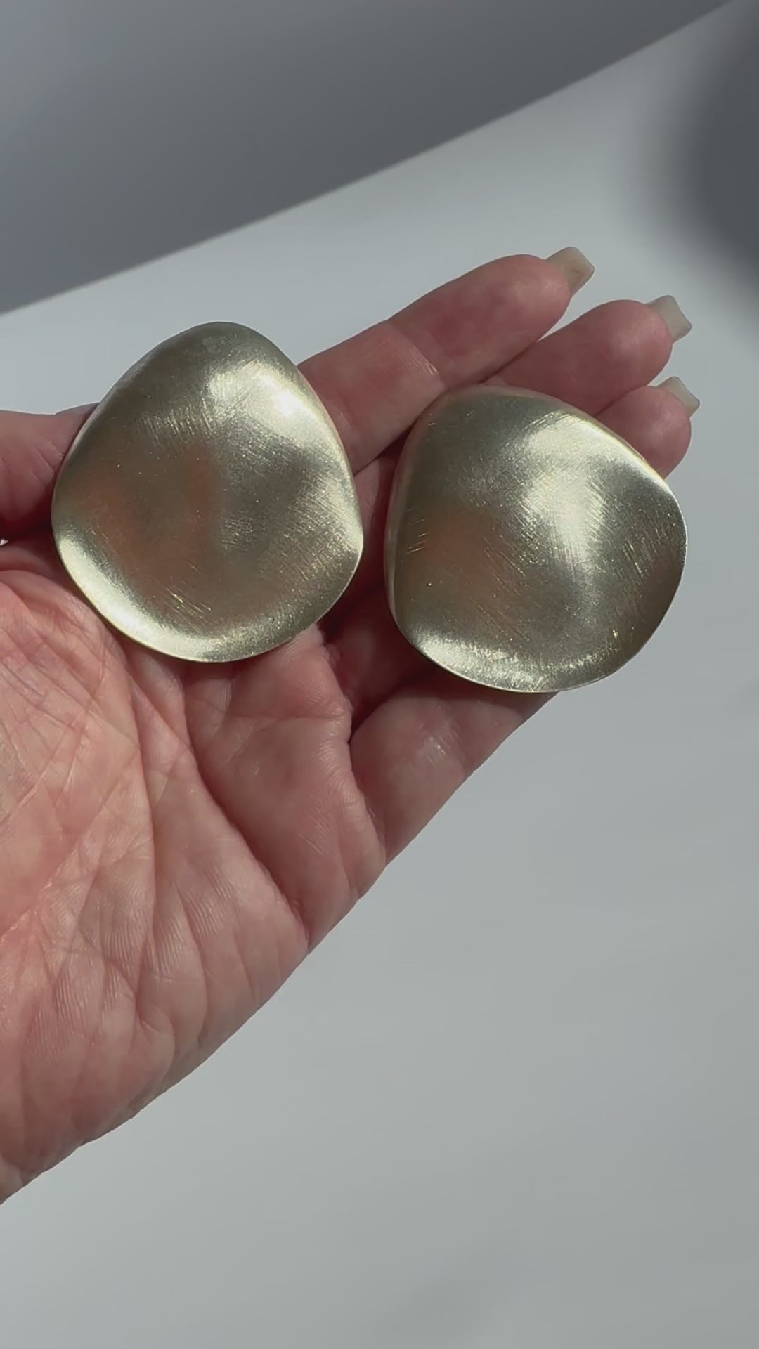 Estate vintage Jondell Enterprises sterling silver abstract geometric textured clip-on earrings with brushed finish and organic sculptural forms